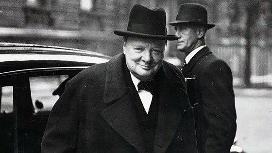 Winston Churchill coming out of a car black and white photo
